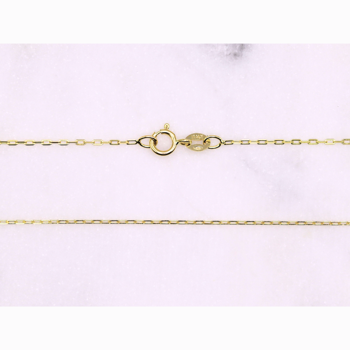 Kabel schakelketting 0,75 mm 14k goud, detail van de sluiting