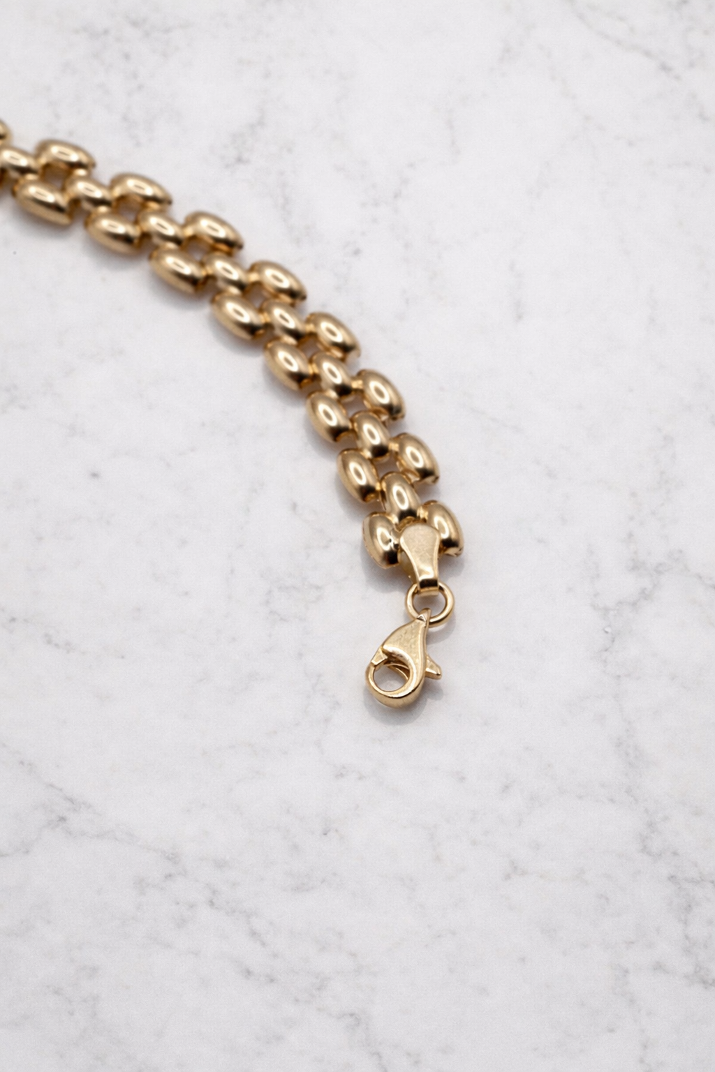 Panter armband 8,5 mm 14k goud, detail van de karabijnsluiting