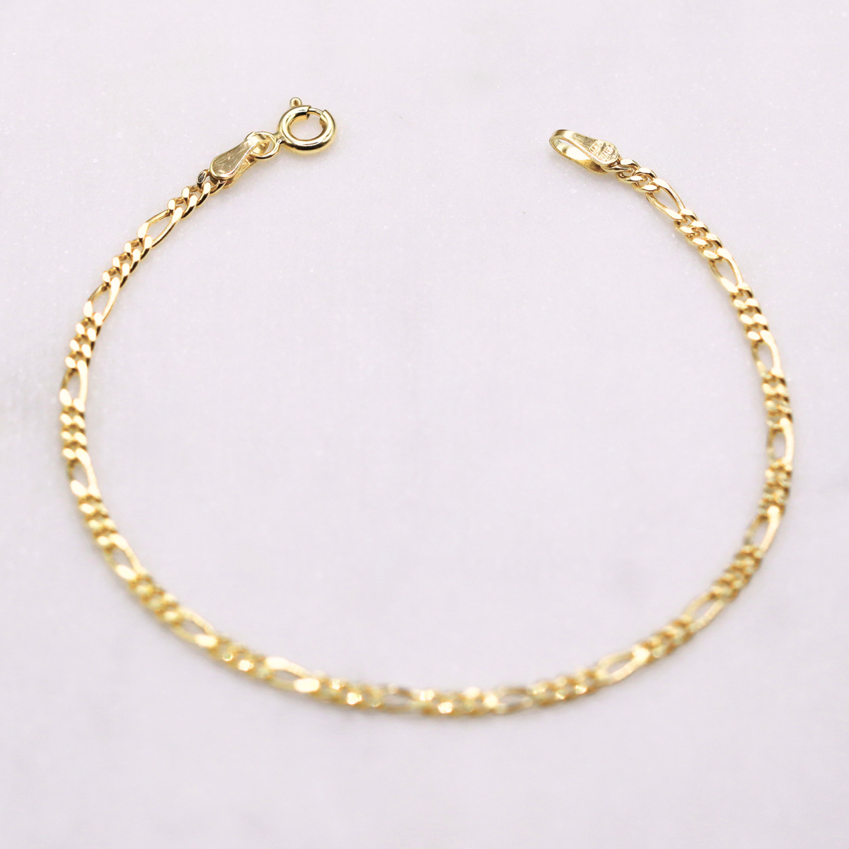 Figaro armband 2,25 mm 14k goud, foto 5