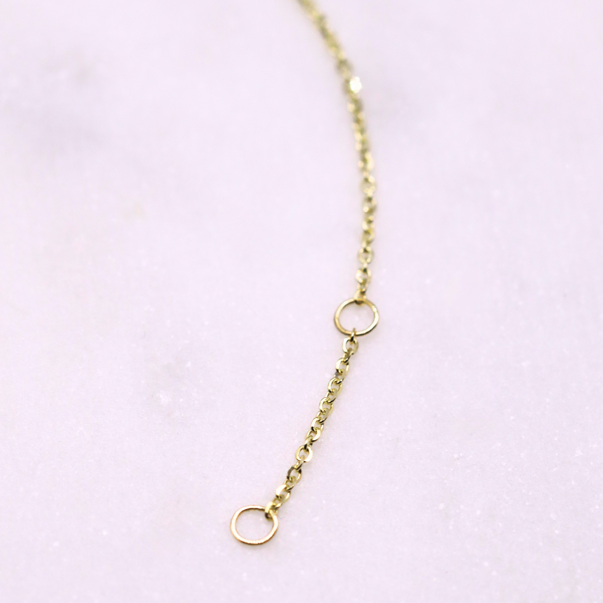 Edelsteen armband malachiet & parelmoer 1 mm 14k goud, detail van de springsluiting