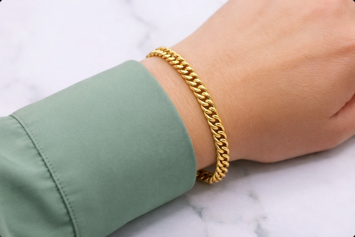 Gourmet armband dubbel 5 mm 14k goud, gedragen om de pols
