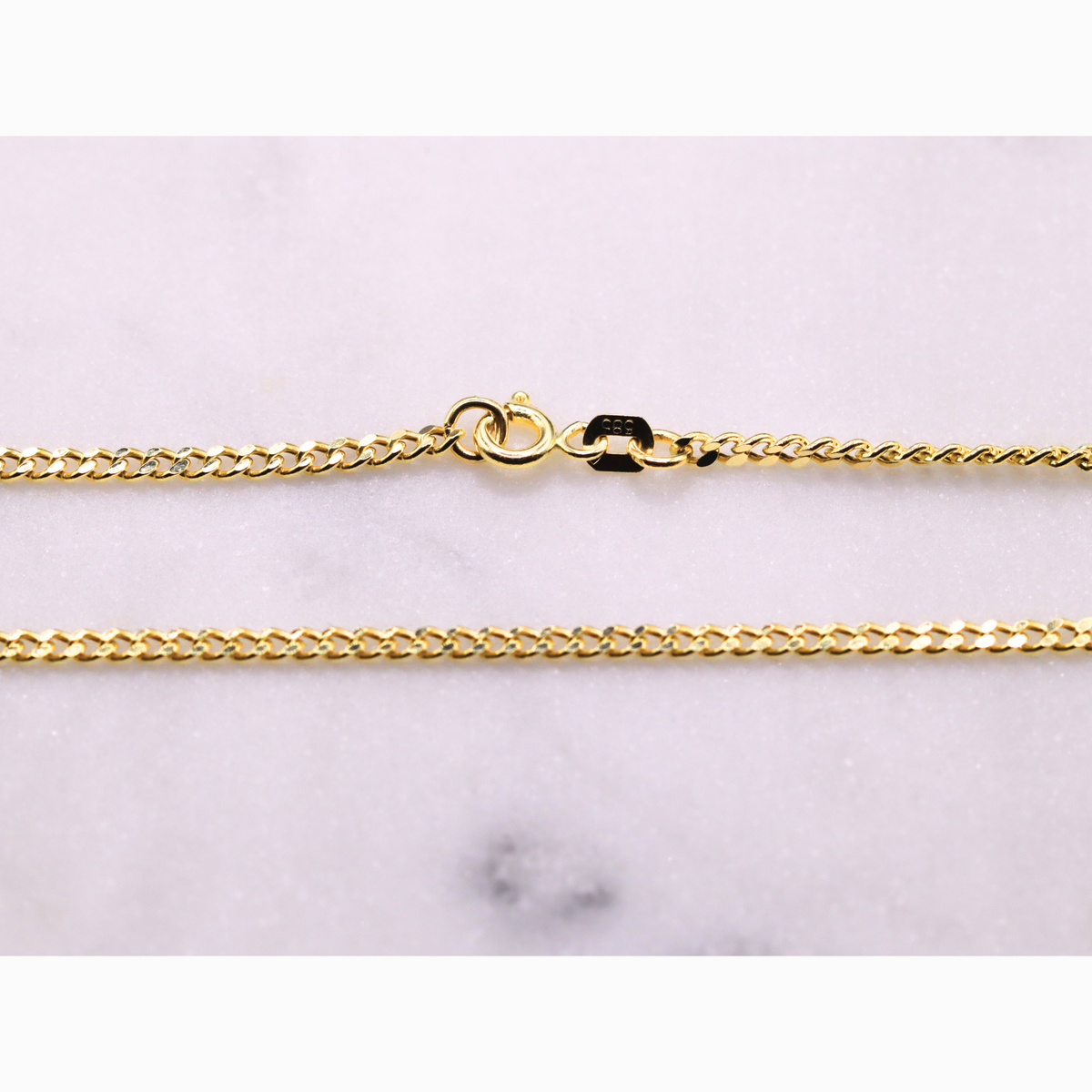 Gourmet ketting 2,5 mm 14k goud, detail van de sluiting