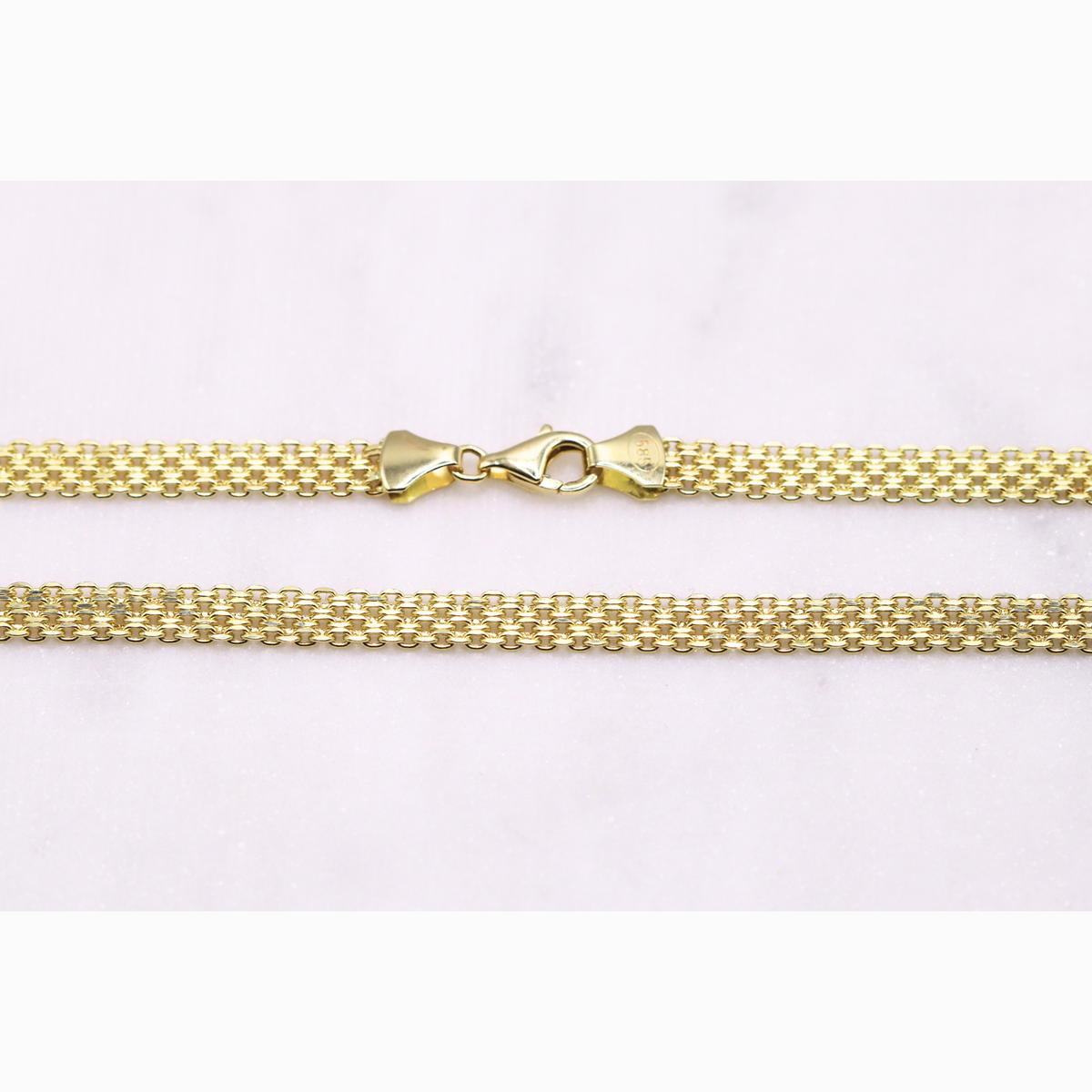 Bismarck ketting 5,5 mm 14k goud, detail van de sluiting