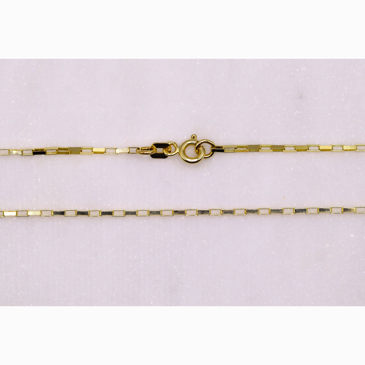 Boxketting 1,25 mm 14k goud, detail van de sluiting