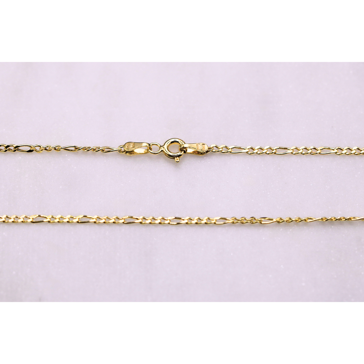 Figaro schakelketting 2 mm 14k goud, detail van de sluiting