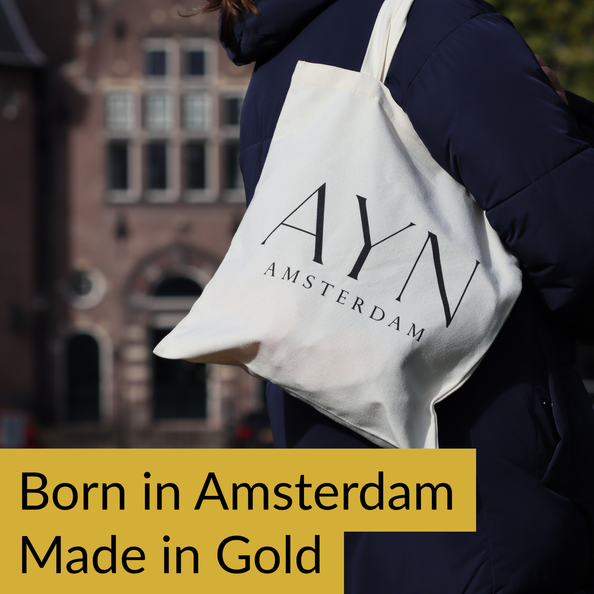 AYN Amsterdam katoenen tas bij Geweven stretch armband 5,5 mm 14k goud