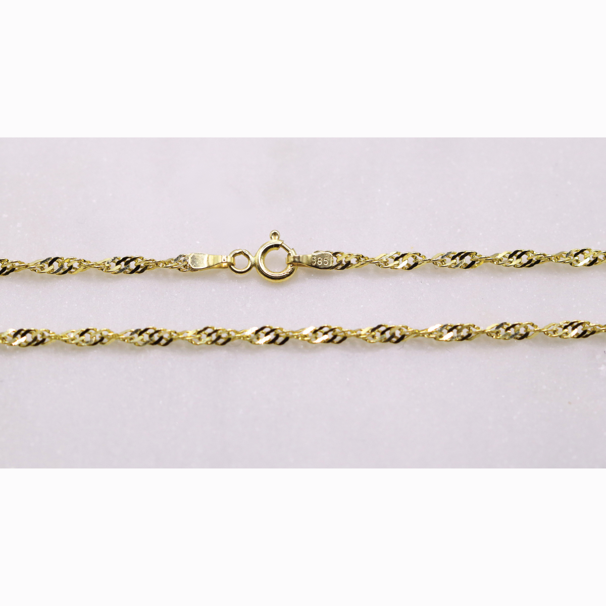 Twist ketting 2,25 mm 14k goud, detail van de sluiting